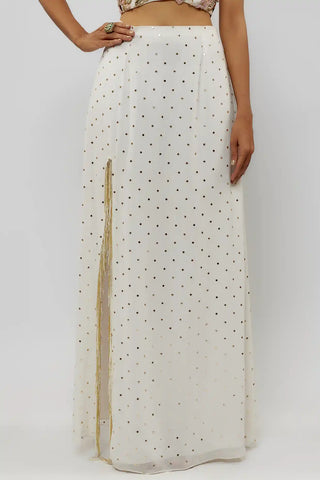 Off-white embroidered choli and slit skirt