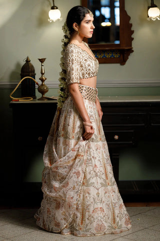 Beige embroidered choli with printed lehenga and dupatta