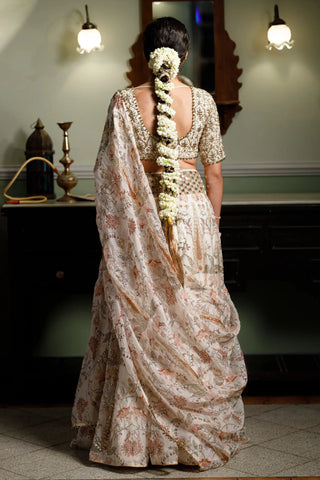 Beige embroidered choli with printed lehenga and dupatta