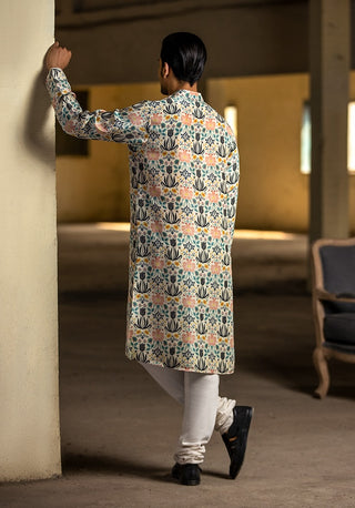 Cream printed silk kurta and churidar