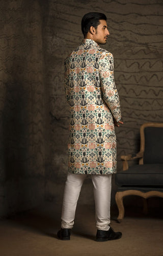 Cream printed sherwani and churidar