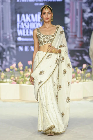 Ivory choli with embroidered saree