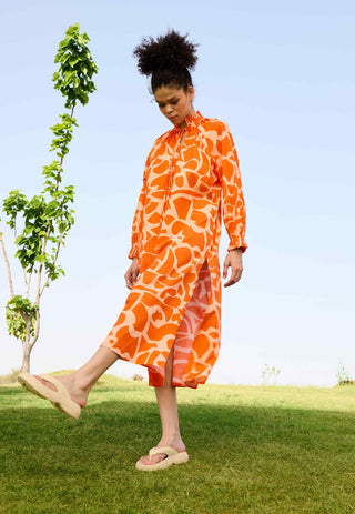 Deconstructed orange daisy dress