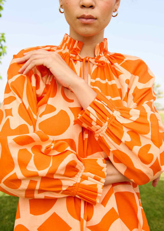 Deconstructed orange daisy dress