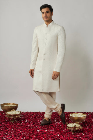 Ivory geometric threadwork sherwani with matching kurta churidar set