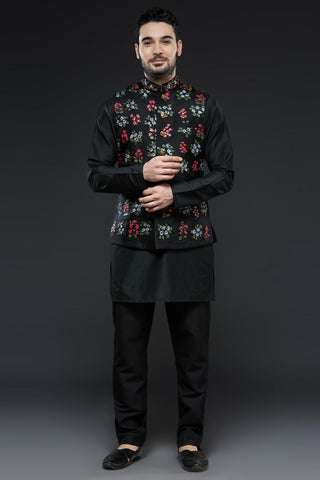 Black cotton silk kurta and slim pant set paired with black organza vest