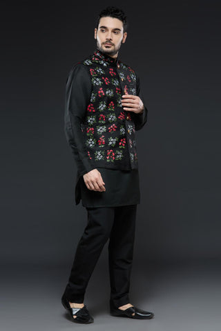 Black cotton silk kurta and slim pant set paired with black organza vest