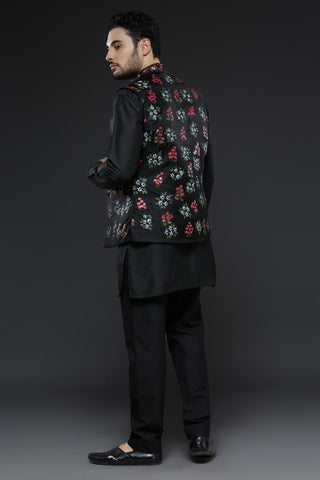 Black cotton silk kurta and slim pant set paired with black organza vest