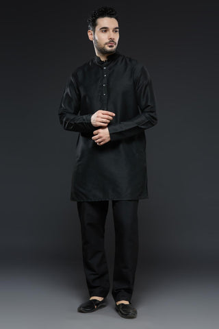 Black cotton silk kurta and slim pant set paired with black organza vest