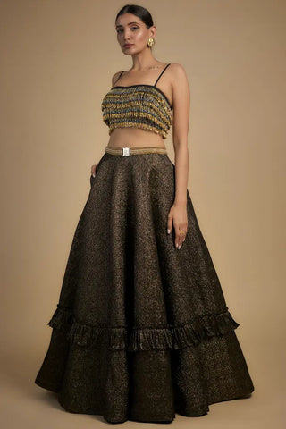 Gold tassel with lace blouse and lehenga