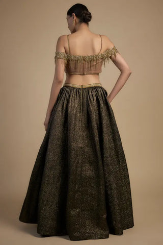 Gold tassel with lace blouse and lehenga