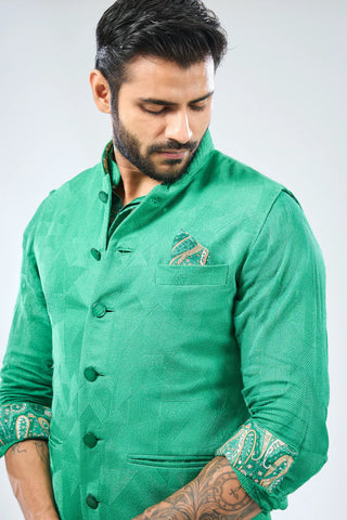 Emerald green thread embroidered kurta with bundi and matching pant