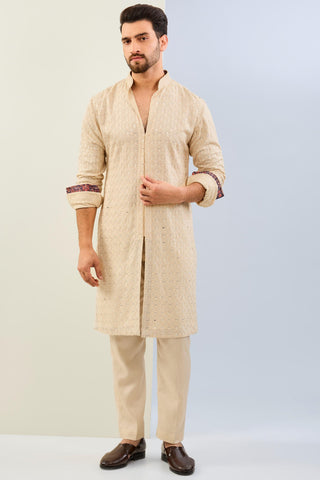 Cream leaf embroidered kurta print detailing with matching cotton silk pant