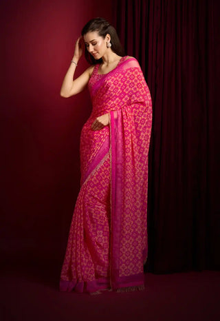 Pink lady orchid embroidered saree and net blouse