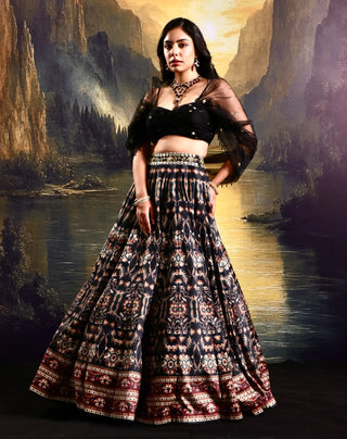 Black printed suede lehenga with a pleated embroidered blouse