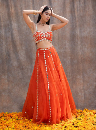 Rust orange mirror work lehenga set