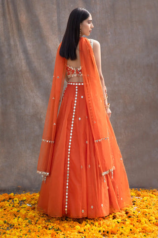 Rust orange mirror work lehenga set