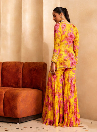 Yellow printed short jacket, blouse and sharara