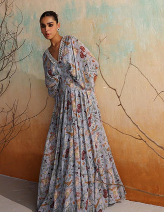 Powder blue printed draped full-length dress with embellished neckline