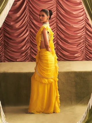 Chitra yellow choli and pre-draped ruffle saree