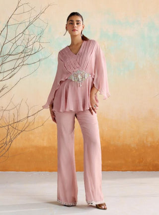 Dusty pink draped peplum top with flared pants