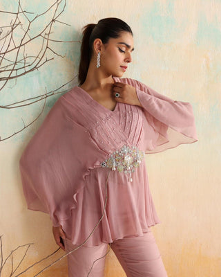 Dusty pink draped peplum top with flared pants