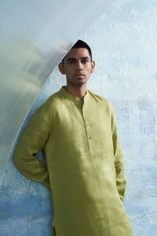 Aura sheen green straight kurta and white salwar