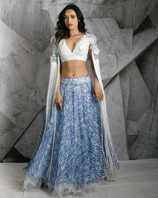 Statement fringe blue lehenga and cape set