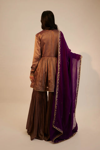 Purple embroidered short anarkali paired with garara pants and dupatta