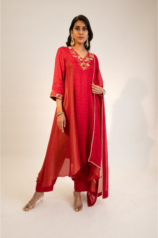 Red embroidered kurta paired with pants and dupatta