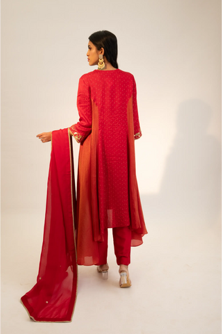 Red embroidered kurta paired with pants and dupatta