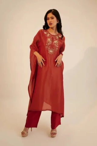 Red embroidered kaftan kurta paired with pants