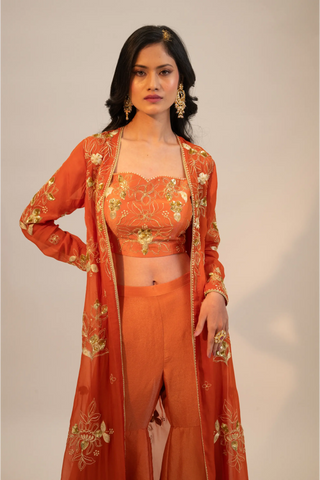 Rust embroidered organza jacket paired with pants and blouse