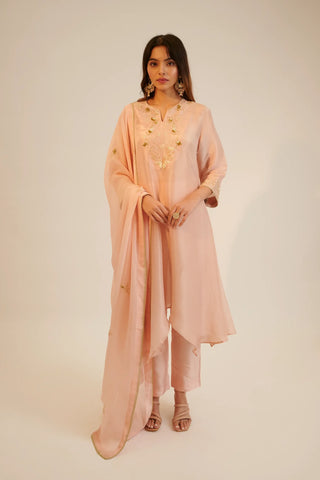 Peach embroidered asymmetric kurta paired with pants and dupatta