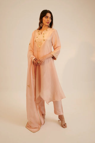 Peach embroidered asymmetric kurta paired with pants and dupatta