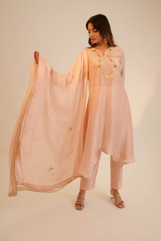 Peach embroidered asymmetric kurta paired with pants and dupatta