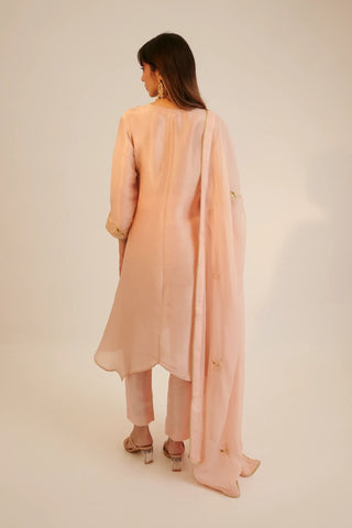 Peach embroidered asymmetric kurta paired with pants and dupatta