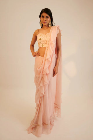 Peach pre draped organza saree with embroidered blouse