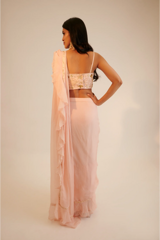 Peach pre draped organza saree with embroidered blouse