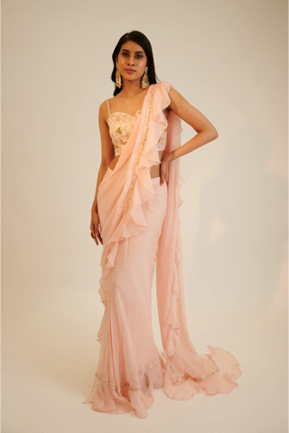 Peach pre draped organza saree with embroidered blouse