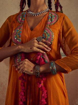 Orange drape dress rang with cape